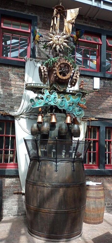 The Rum Story Clock stands over 6 feet tall